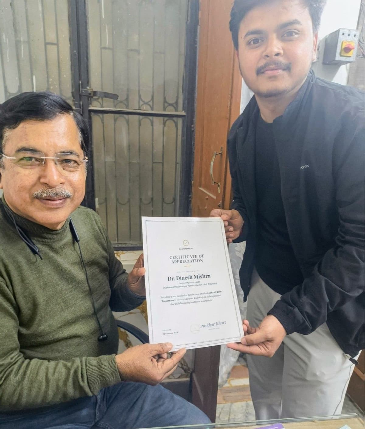 Dr. Dinesh Mishra with DoctorStatus certificate